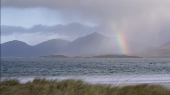 Rainbow over the sea at Luskentyre beach, Scotland